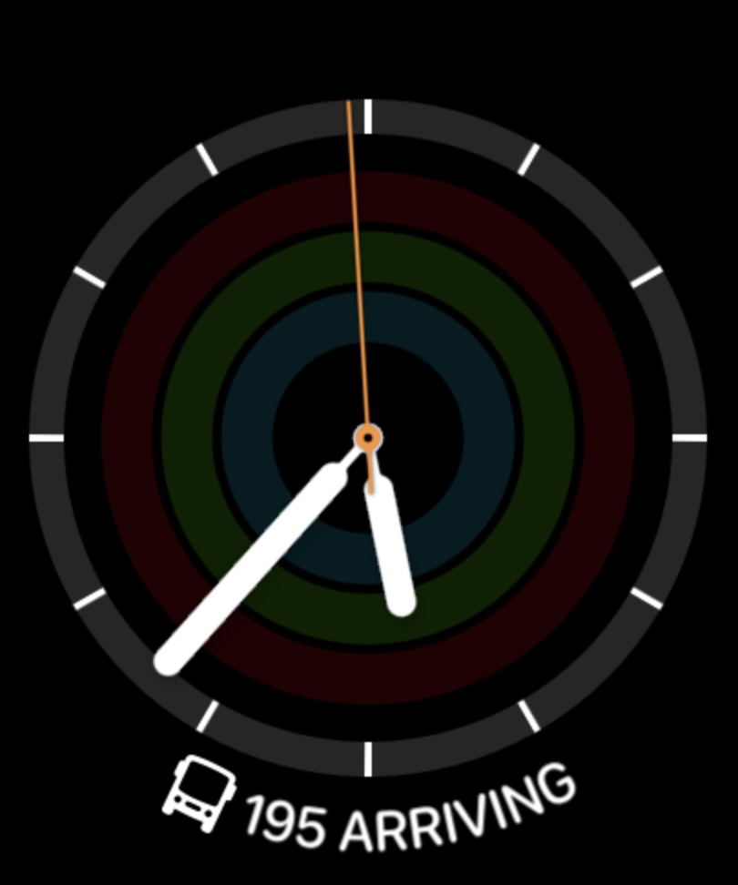 GoBus SG complication on an analog watch face — 195 ARRIVING under the time