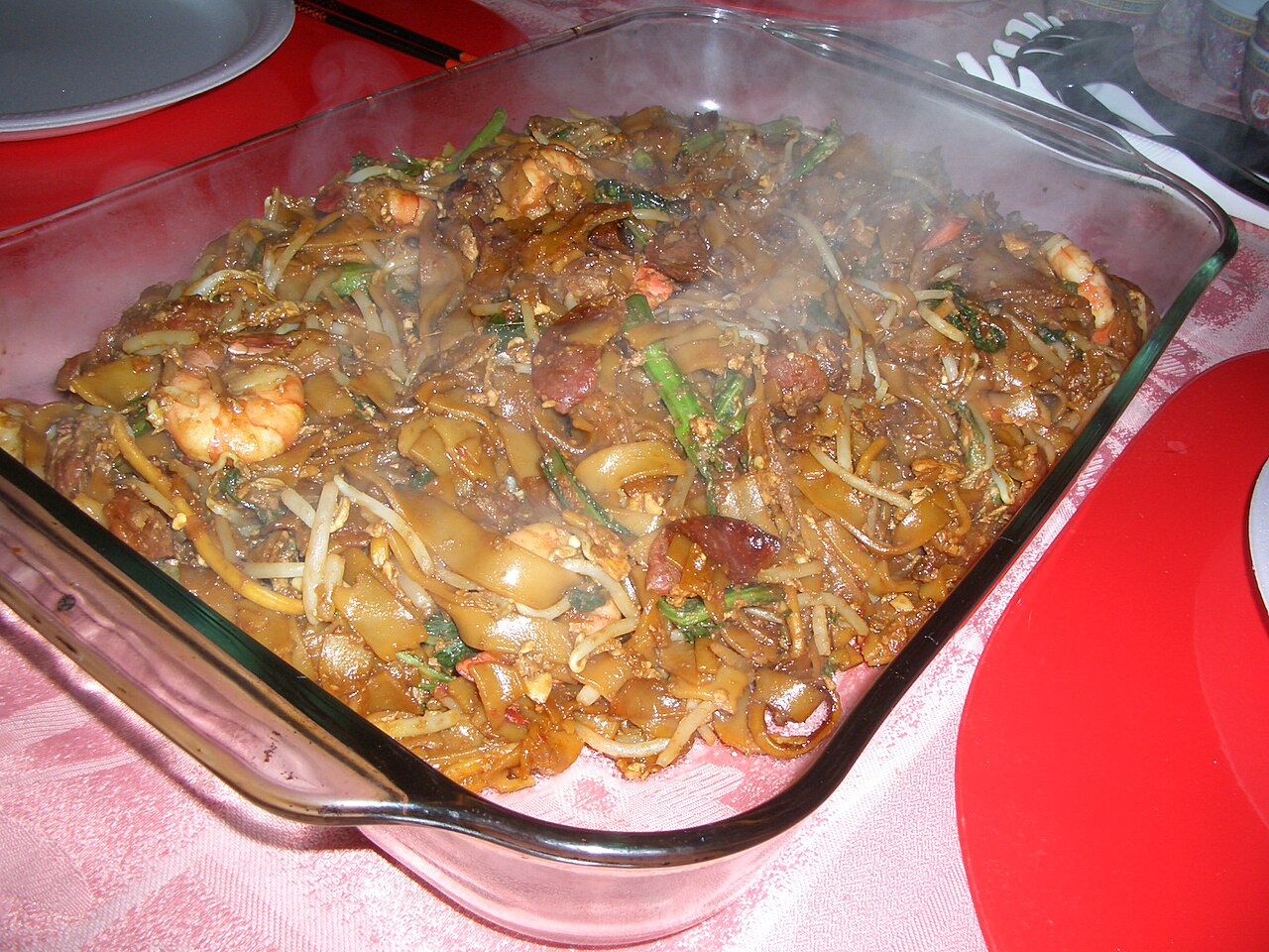 A plate of char kway teow — stir-fried flat rice noodles with cockles, prawns and Chinese sausage