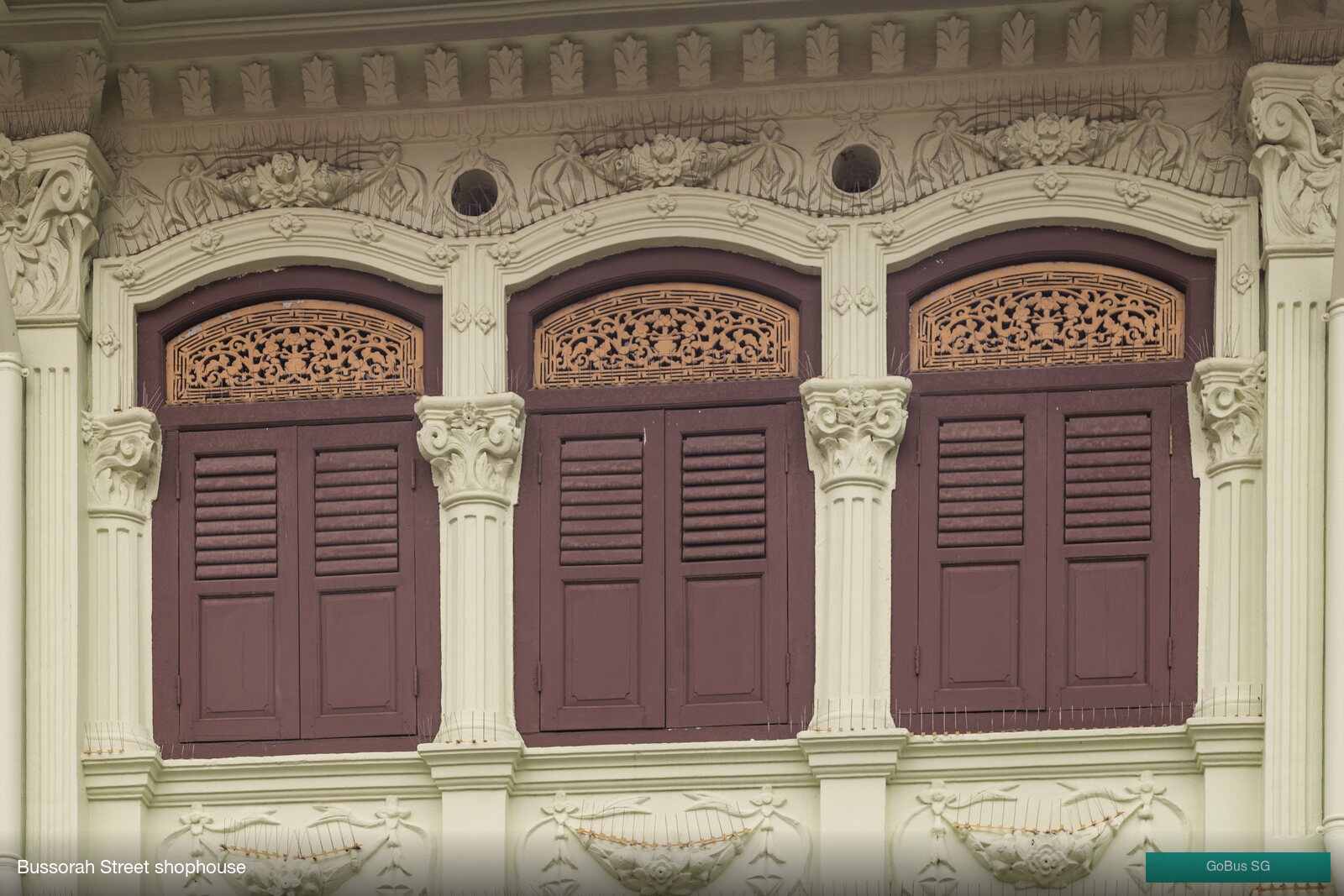 Ornate shophouse facade on Bussorah Street, Kampong Glam, Singapore