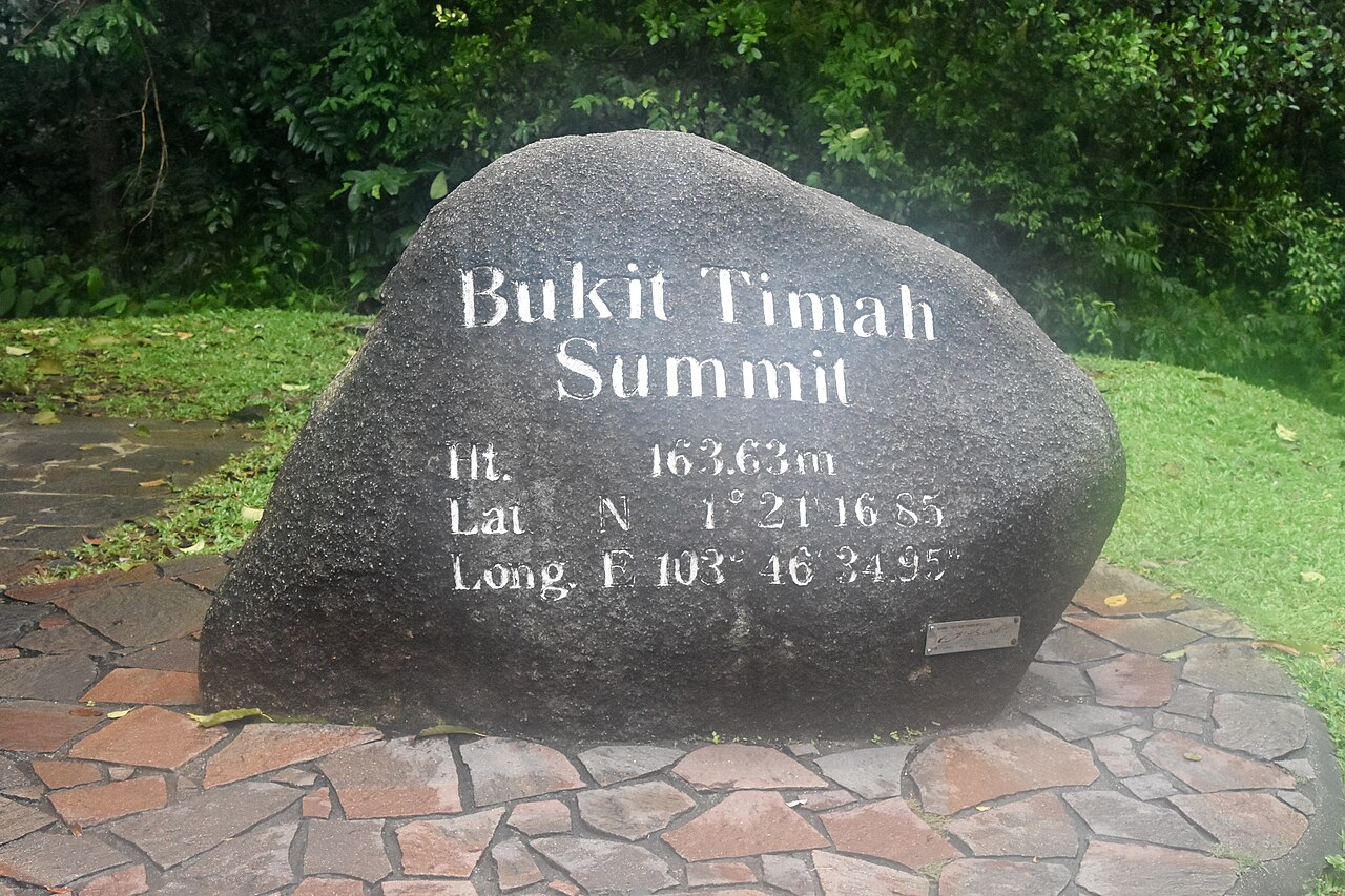 Stone summit marker at the top of Bukit Timah Hill, Singapore's highest natural point